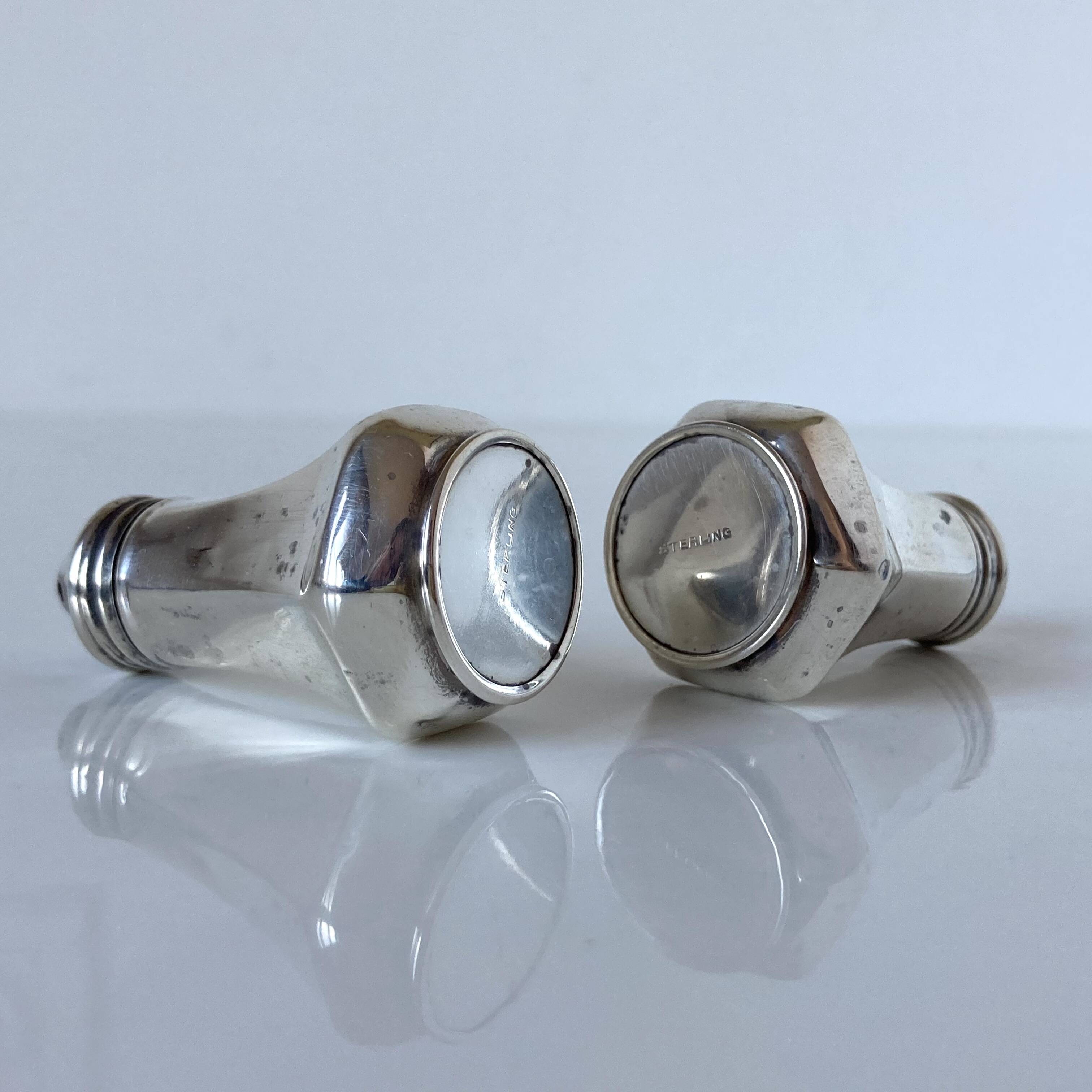 Antique salt and pepper shakers in solid English silver