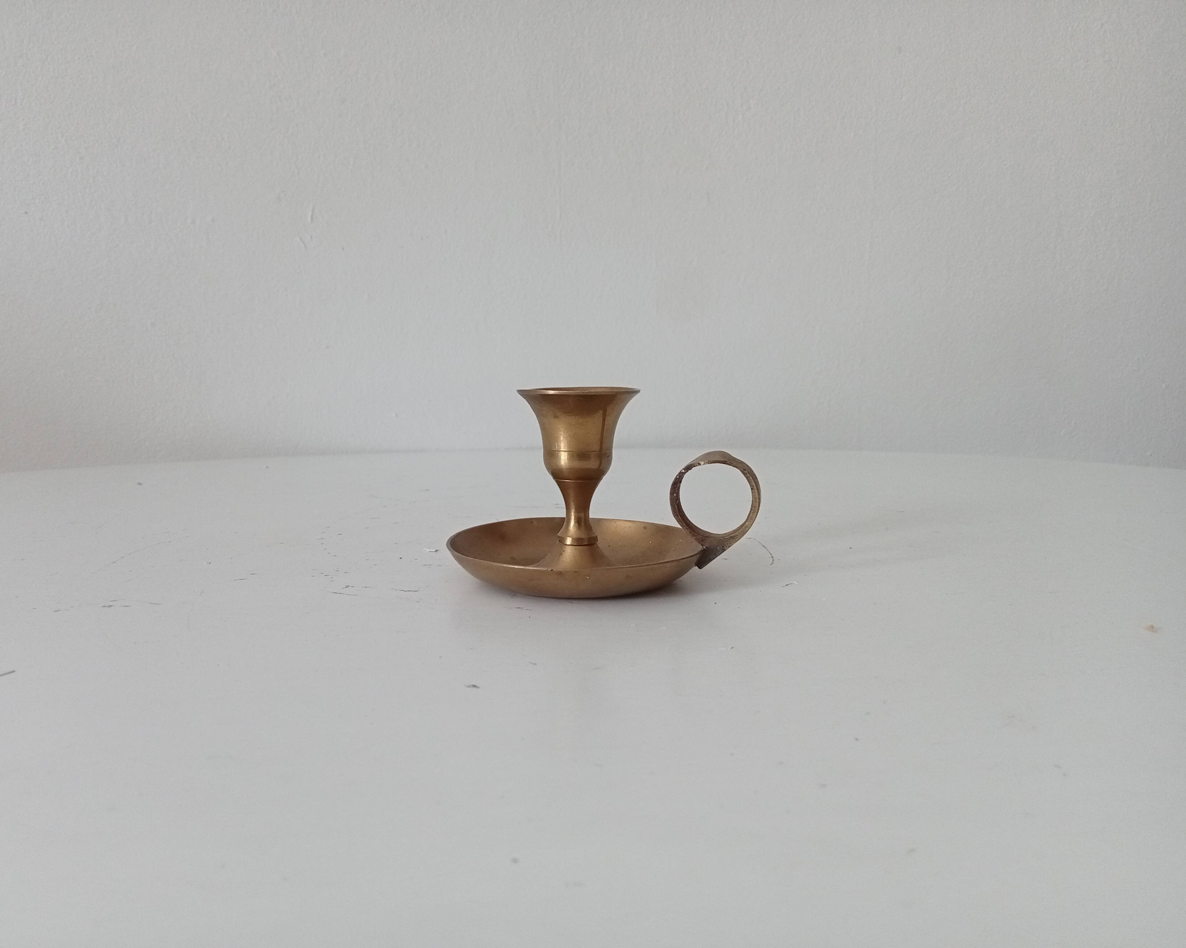 Vintage brass hand candle holder