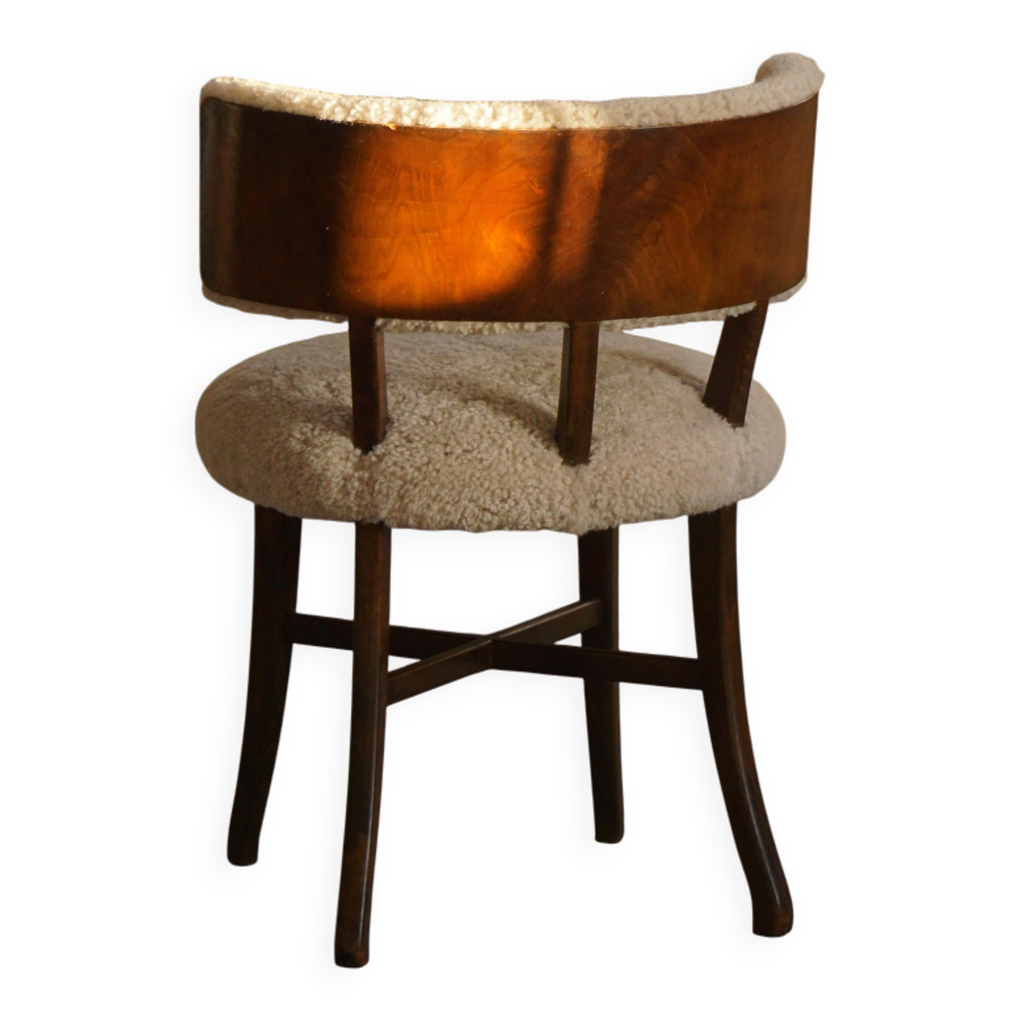 A modern Danish elegant low-back chair, reupholstered in lambswool, 1940s.
