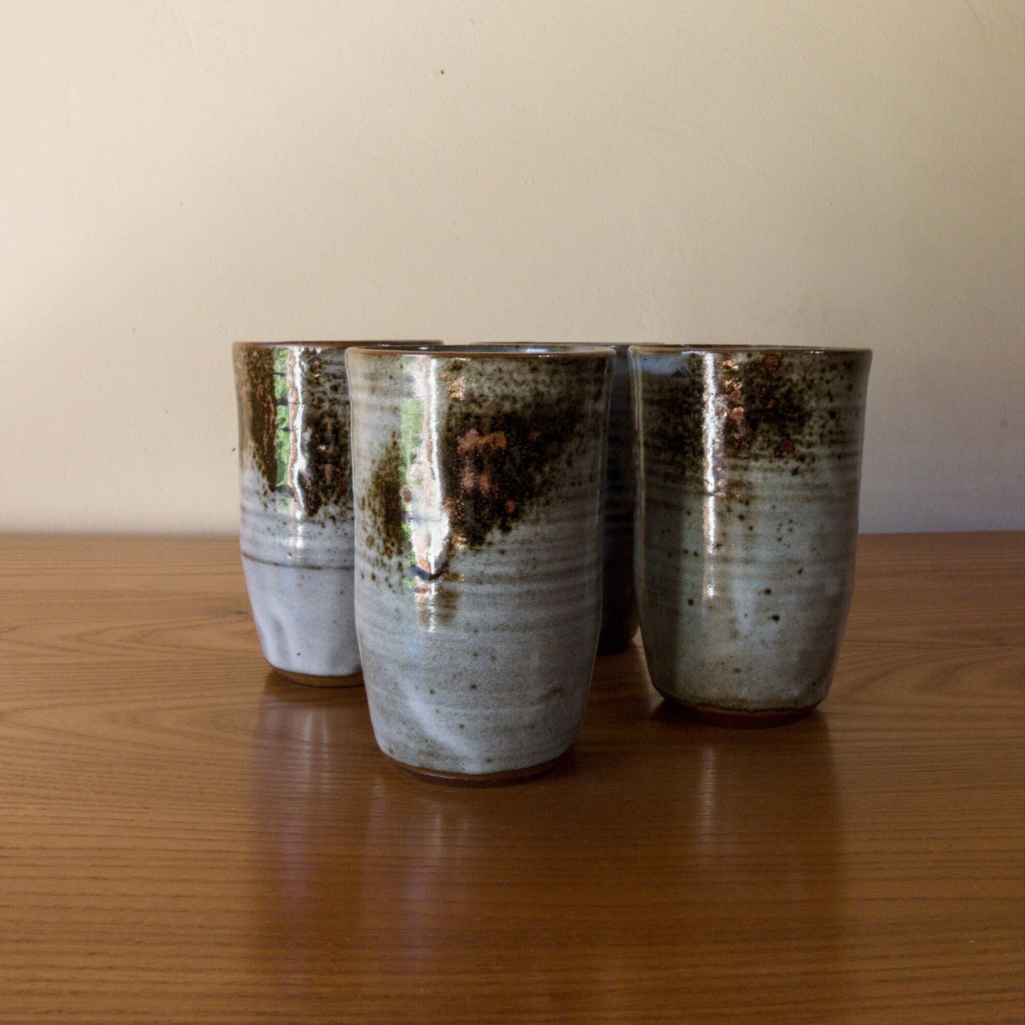 Set of 4 glazed stoneware mugs signed by Thierry and Chantal Robert.