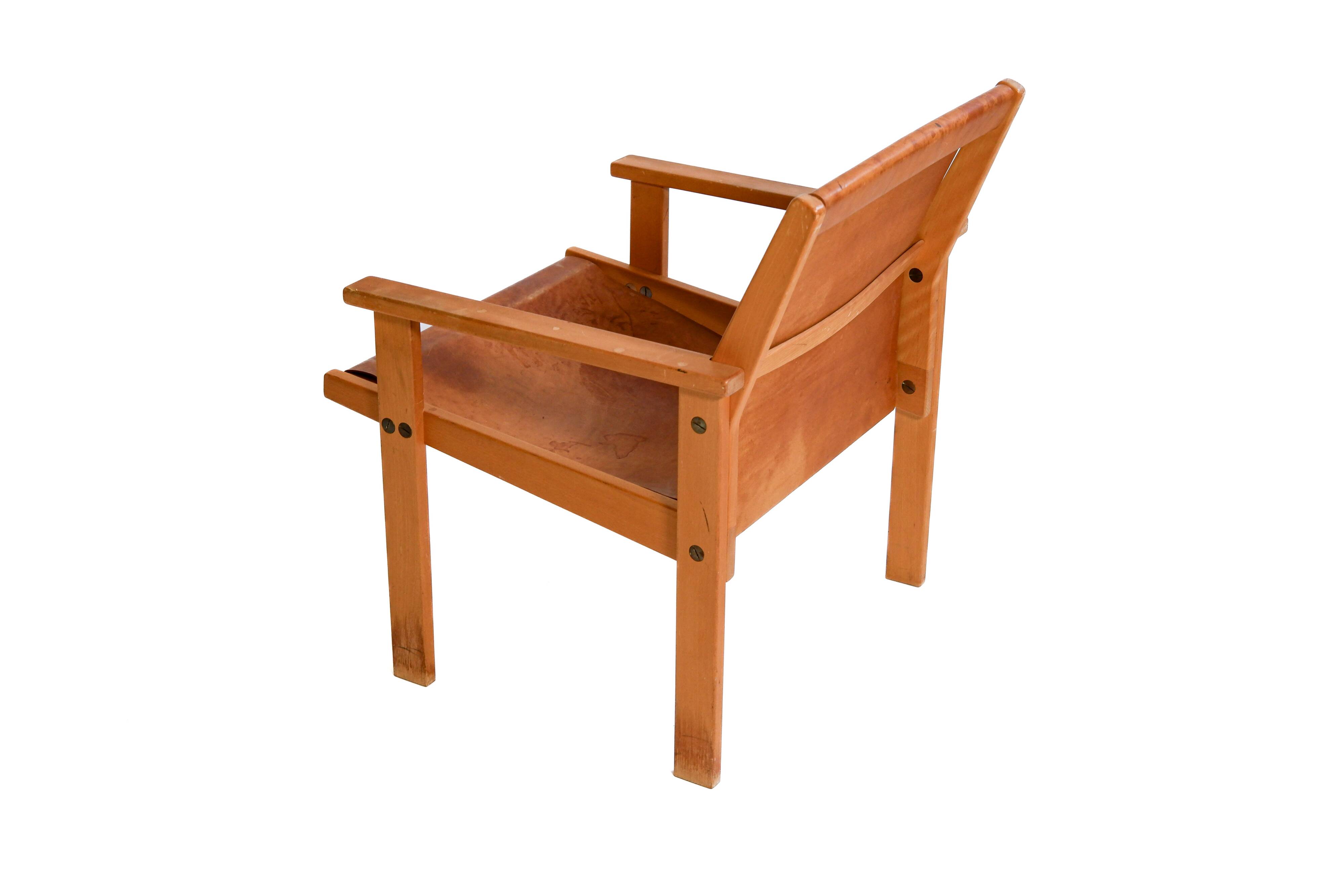 Rare Hans Agne Jakobsson armchair in leather and wood. Circa 1970