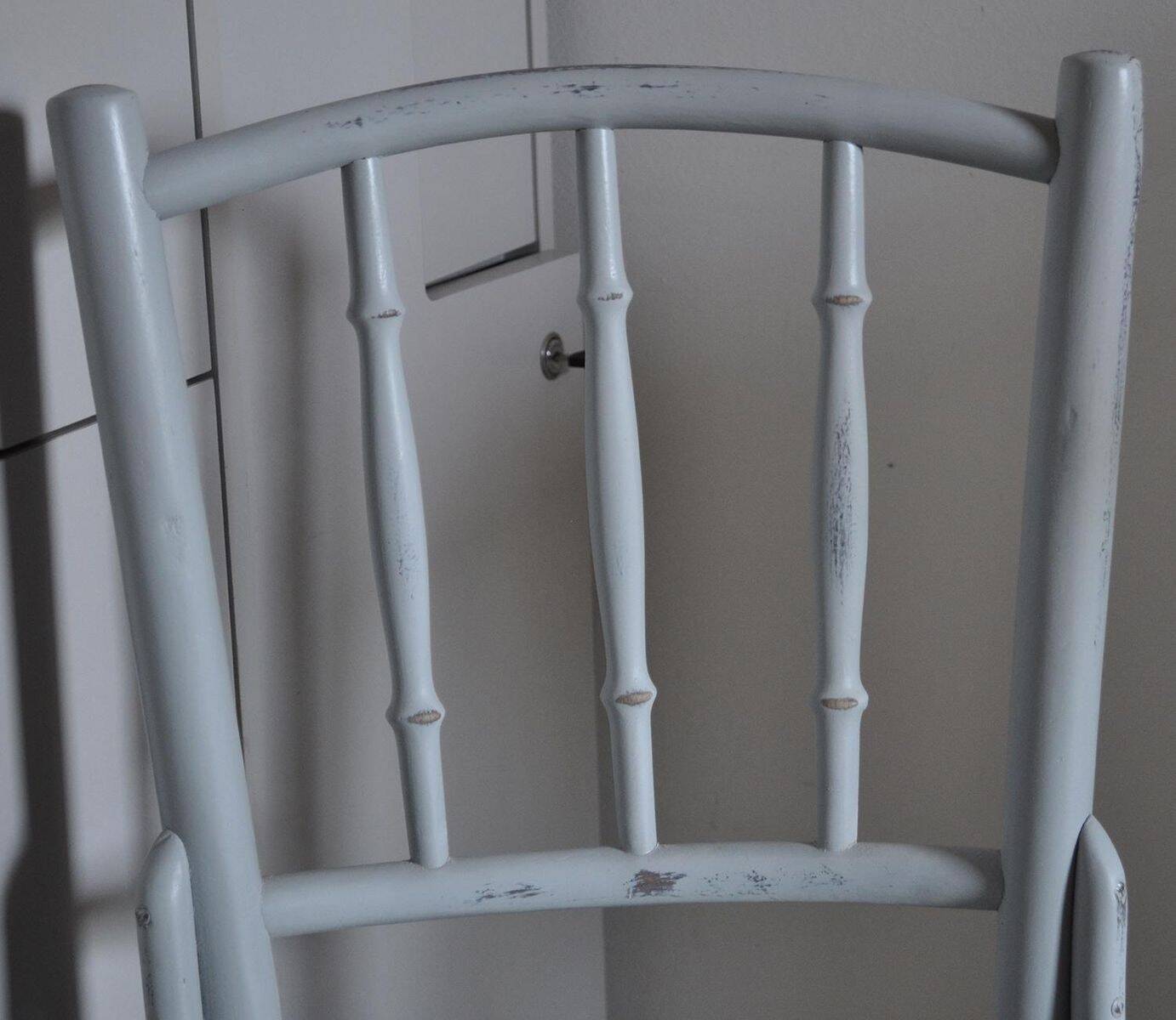 Pair of Lichtig bistro chairs in painted grey beech, pressed seat, circa 1900.