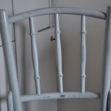 Pair of Lichtig bistro chairs in painted grey beech, pressed seat, circa 1900.