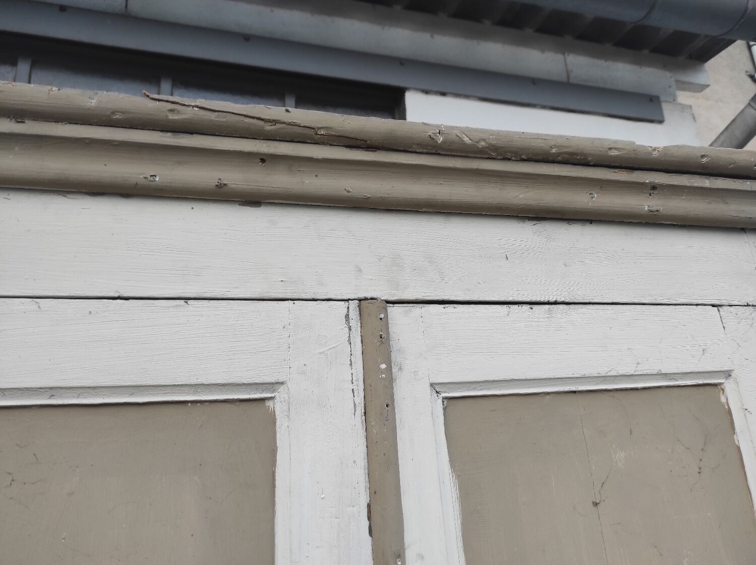 Old rustic Parisian wardrobe patinated in oak and fir