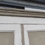 Old rustic Parisian wardrobe patinated in oak and fir