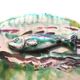 Dabbling plate with trompe l'oeil fish, signed sp,