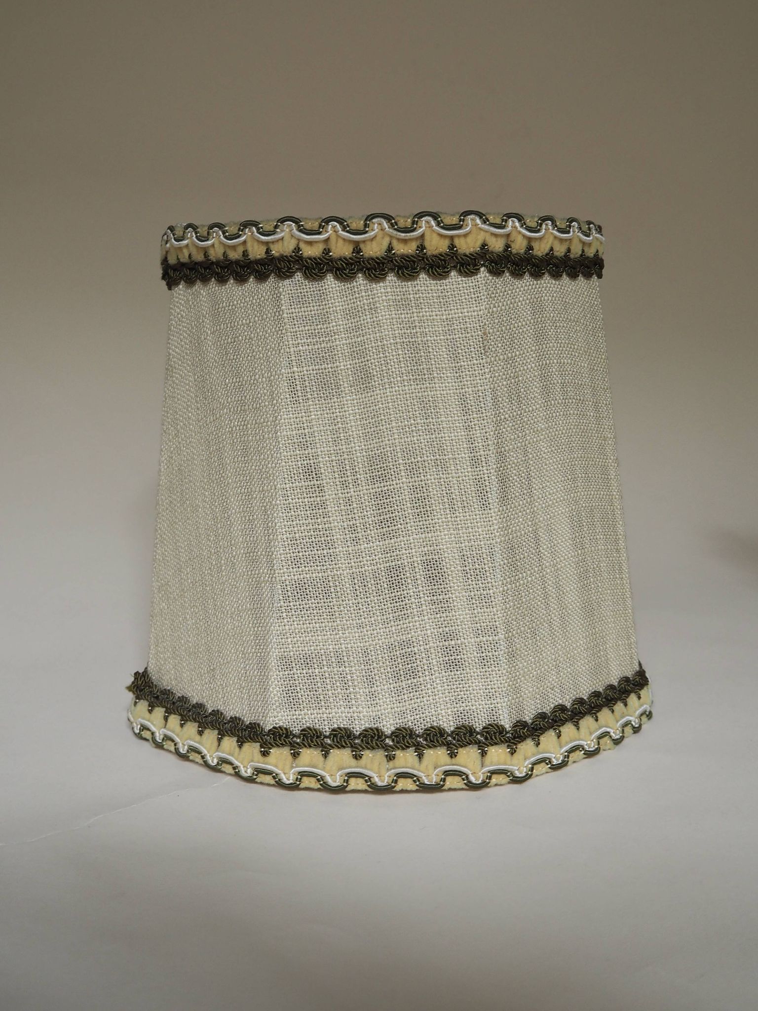 Turned wooden lamp with linen shade