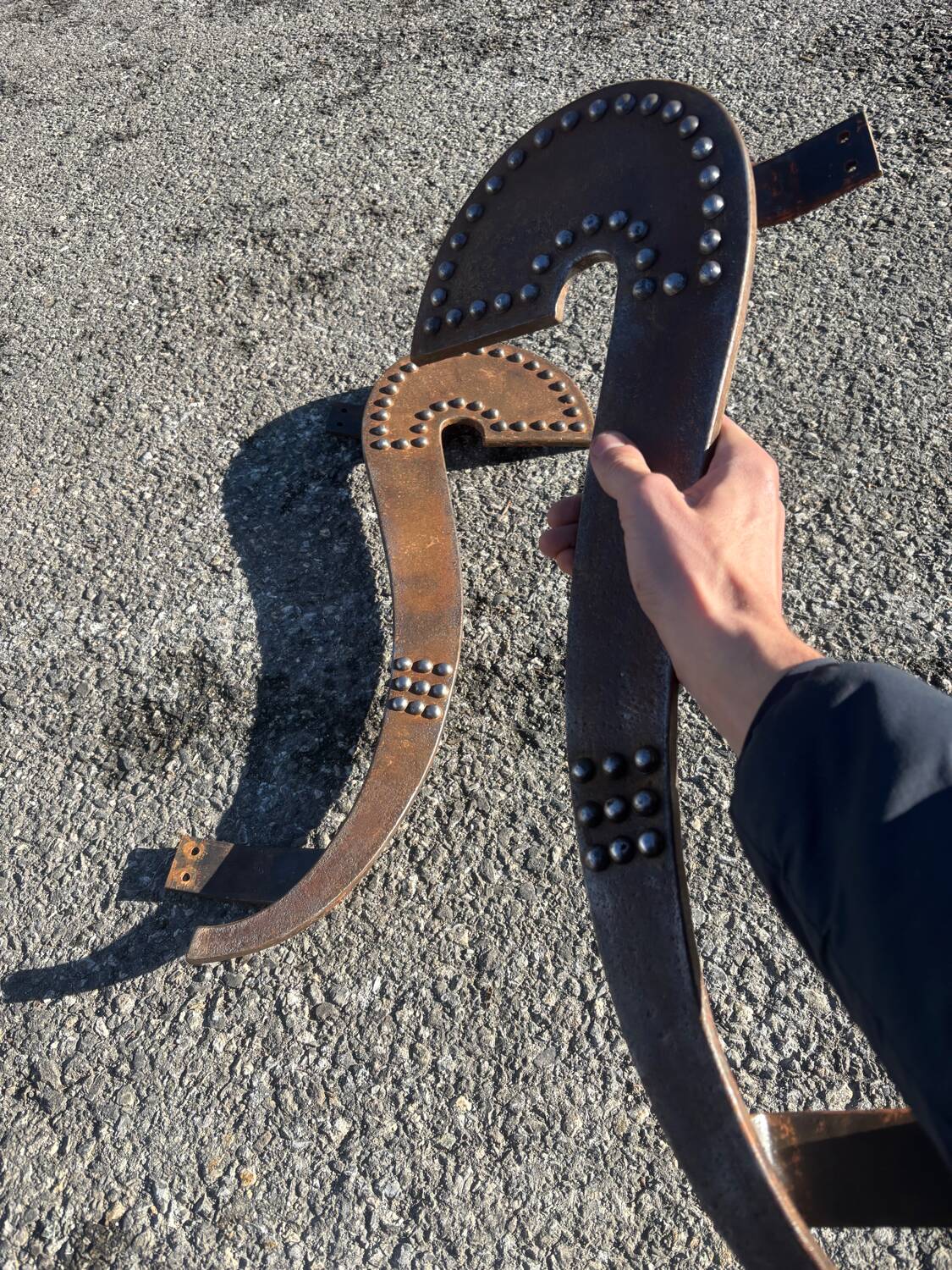 Brutalist pair of handles