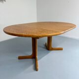 Antique round Scandinavian dining table from the 70s with 1 solid wood extension