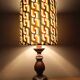 Vintage turned wood lamp, seventies graphic lampshade.