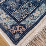 Handcrafted oriental blue and white rug Tunisia vintage fringes