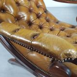Pair of padded Chesterfield armchairs