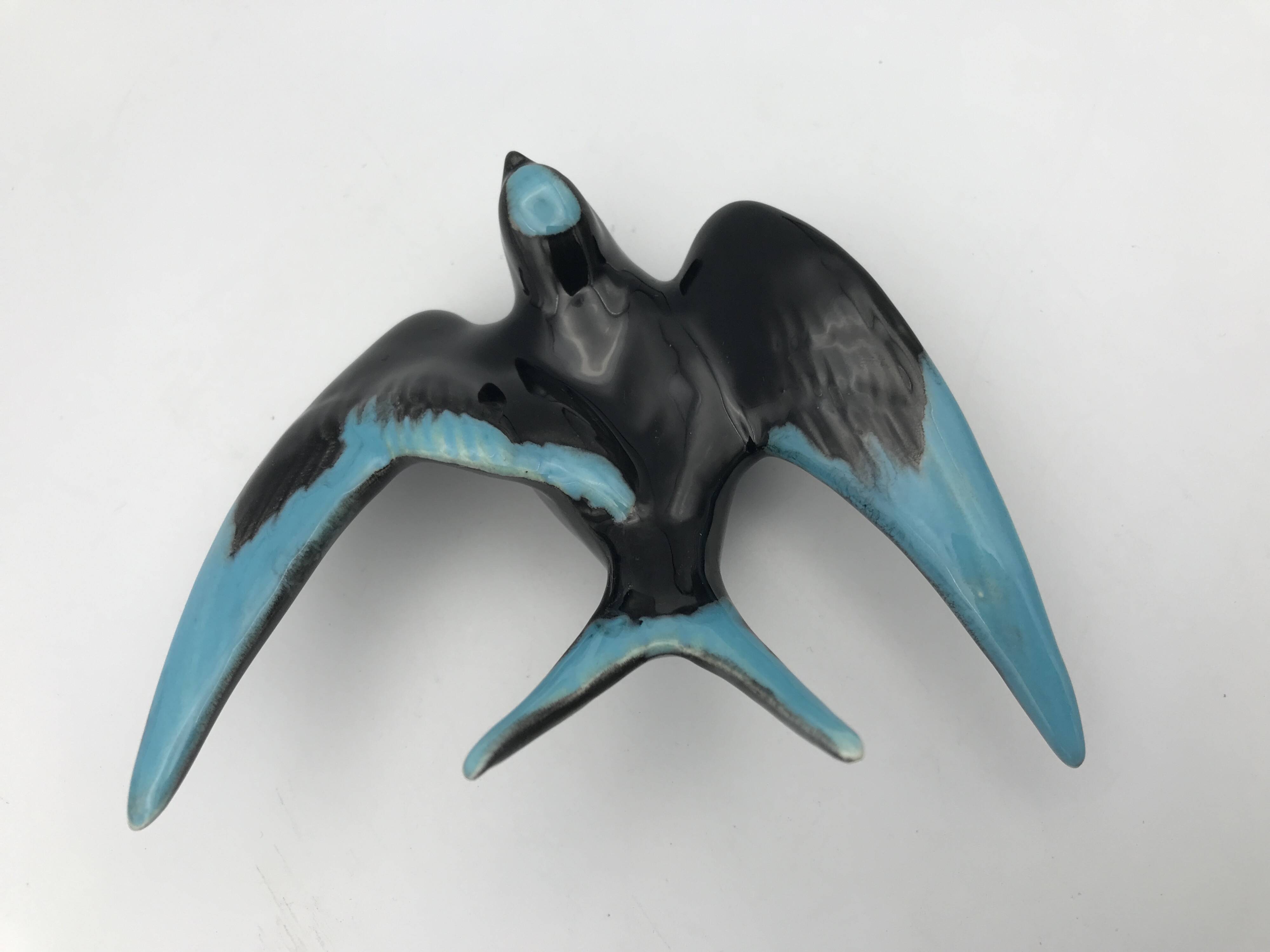 Vintage swallow in two-tone black and blue enameled ceramic