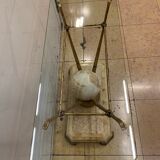 Travertine console from Fournier Paris over glass