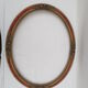 Old oval wooden frame, featuring 8 stucco roses