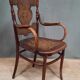 Curved wooden armchair Kohn
