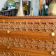 Vintage wooden and rattan chest of drawers with tapered legs.