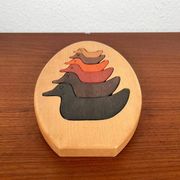 Puzzle en bois vintage avec figurines de canards