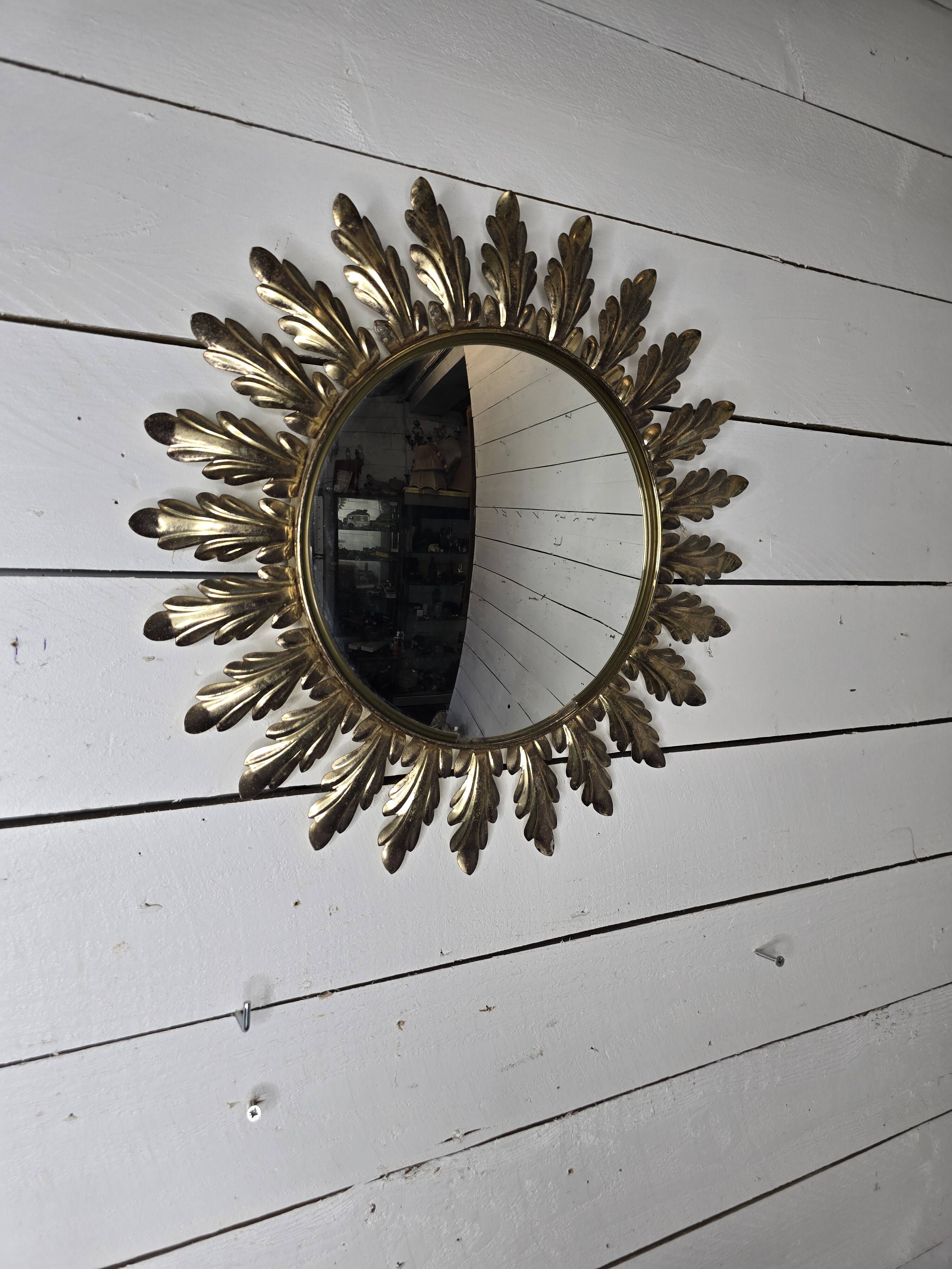 Witch's eye sun mirror in gold metal from the 60s