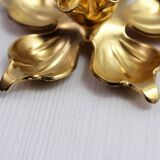 Pair of brass "flower" candlesticks