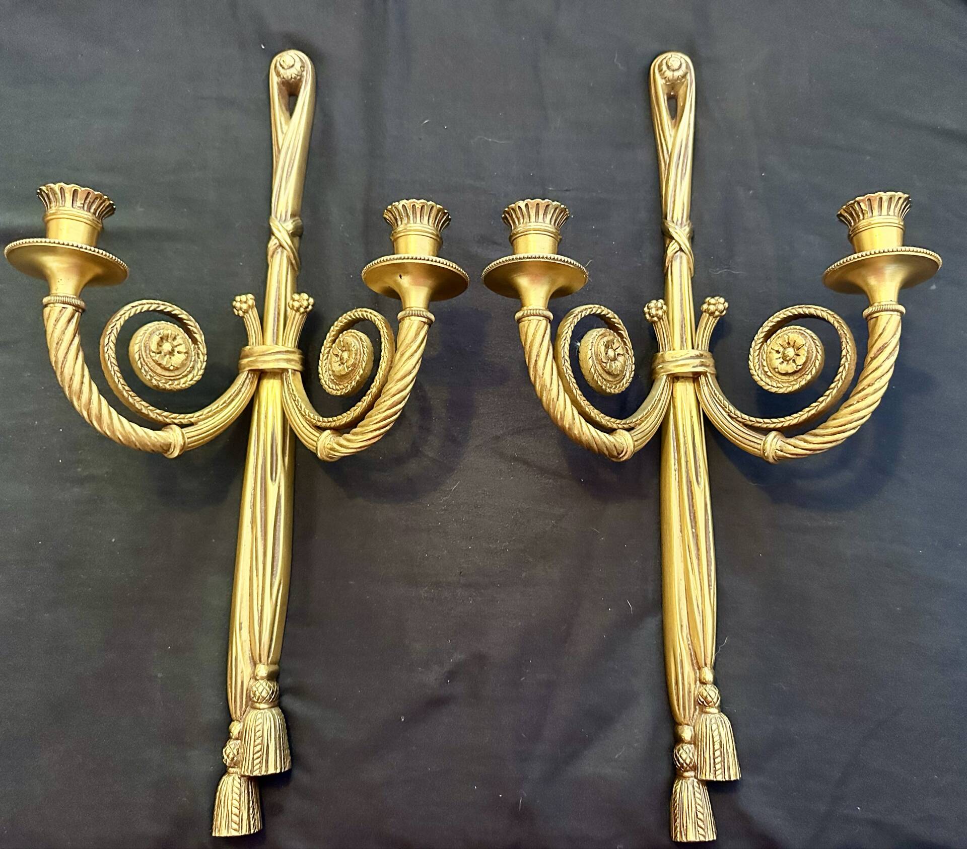 Pair of gilded bronze wall sconces in the Louis XVI style. 20th century.