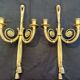 Pair of gilded bronze wall sconces in the Louis XVI style. 20th century.