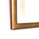 Petit miroir ancien en bois doré et glace biseautée