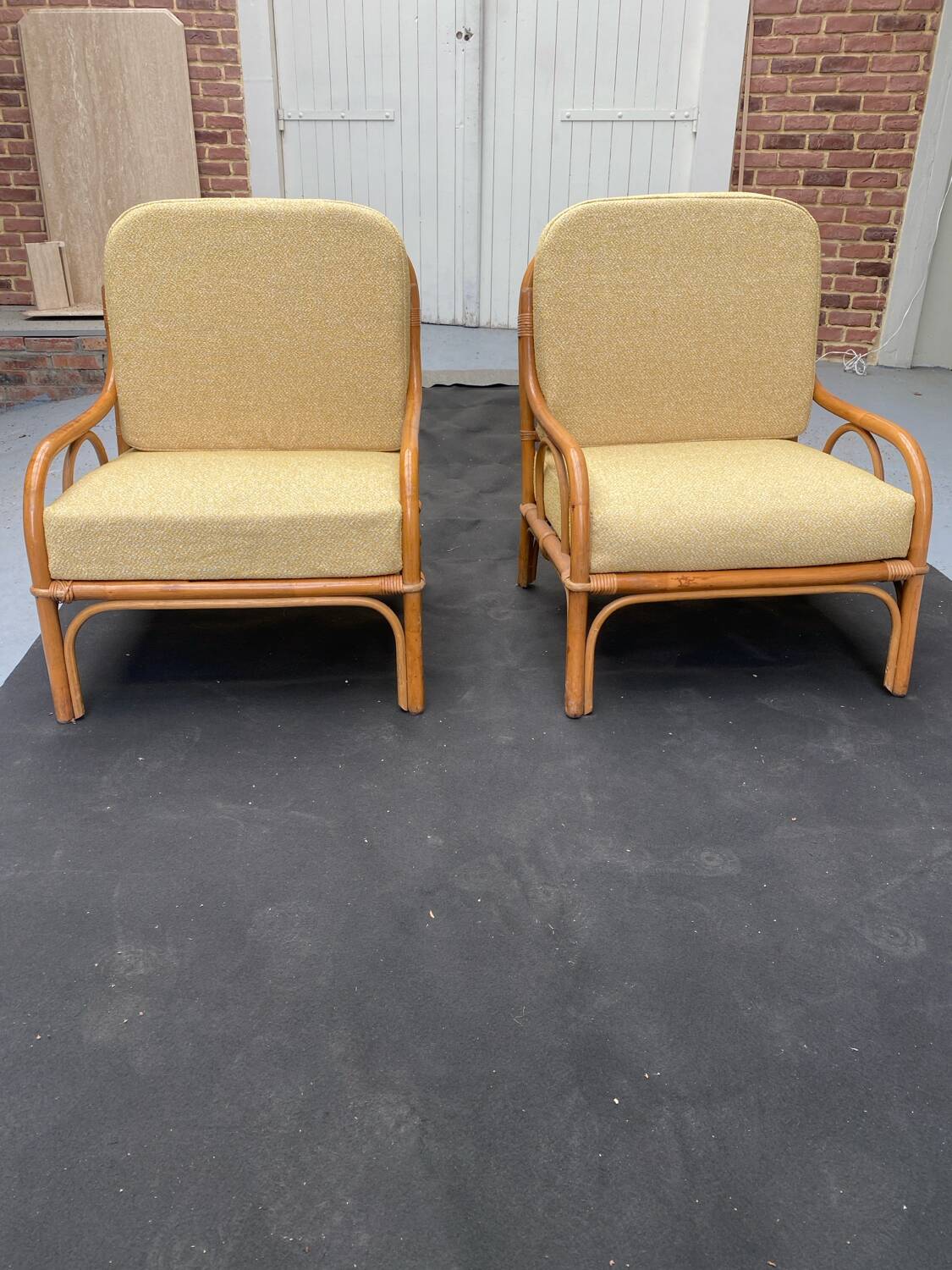 Pair of rattan armchairs