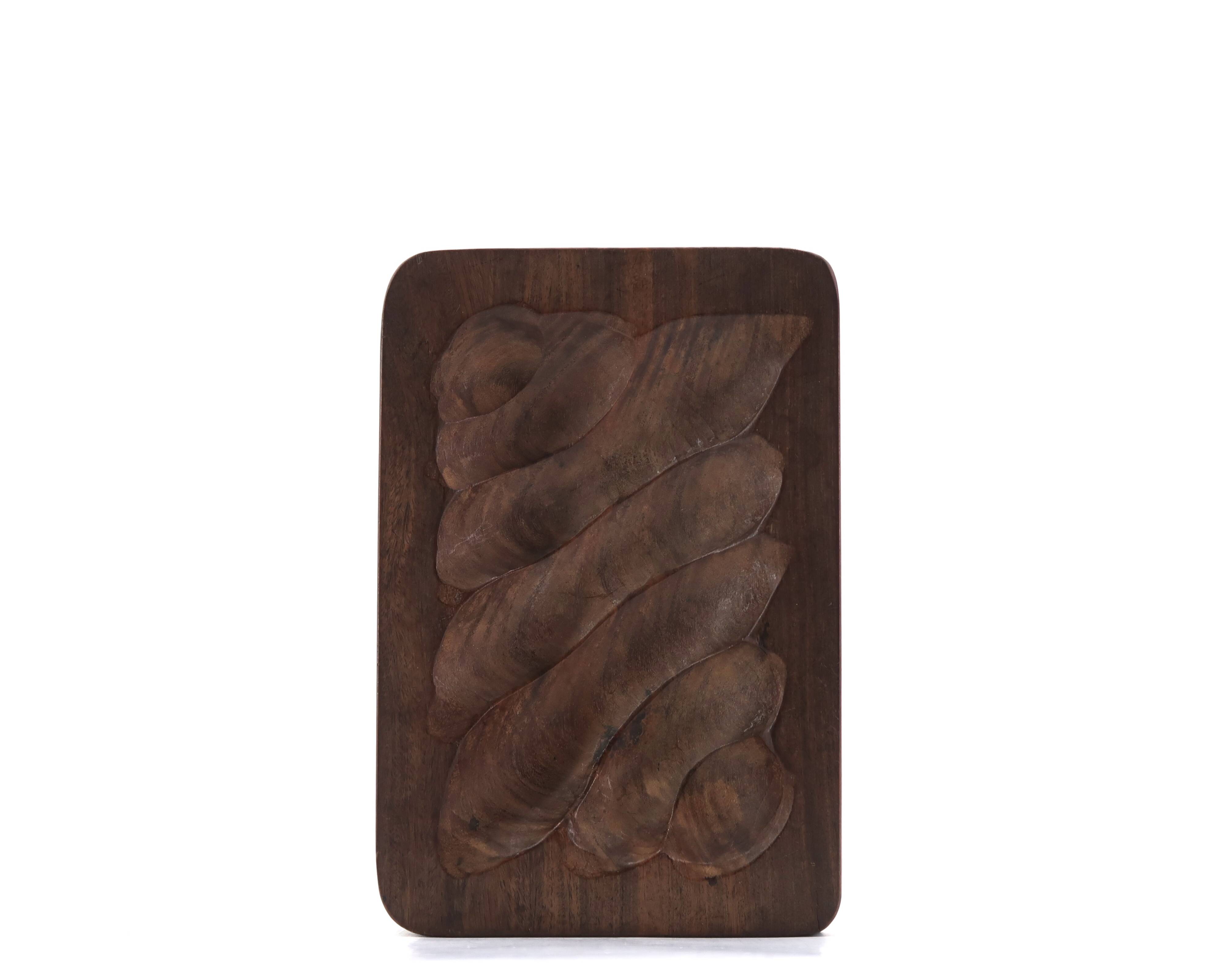 Signed wooden pocket emptier carved with a gouge, 1970s