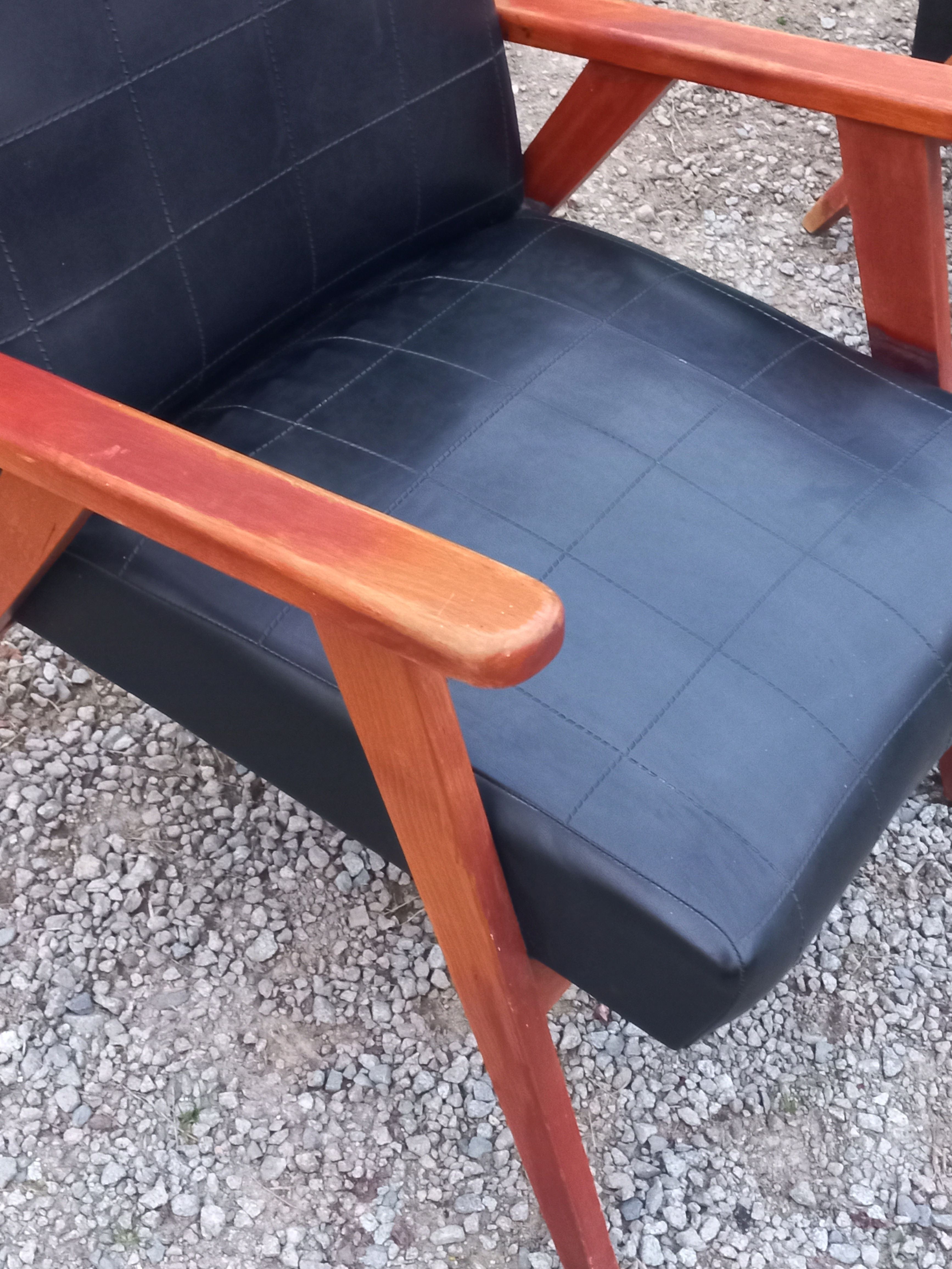 Pair of vintage beech armchairs feet compass covered with black moleskine from the 50s