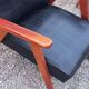 Pair of vintage beech armchairs feet compass covered with black moleskine from the 50s