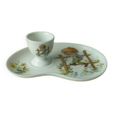 Porcelain egg cup on frame Limoges Poulbot de Paris