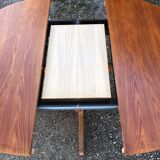 Baumann extendable round table