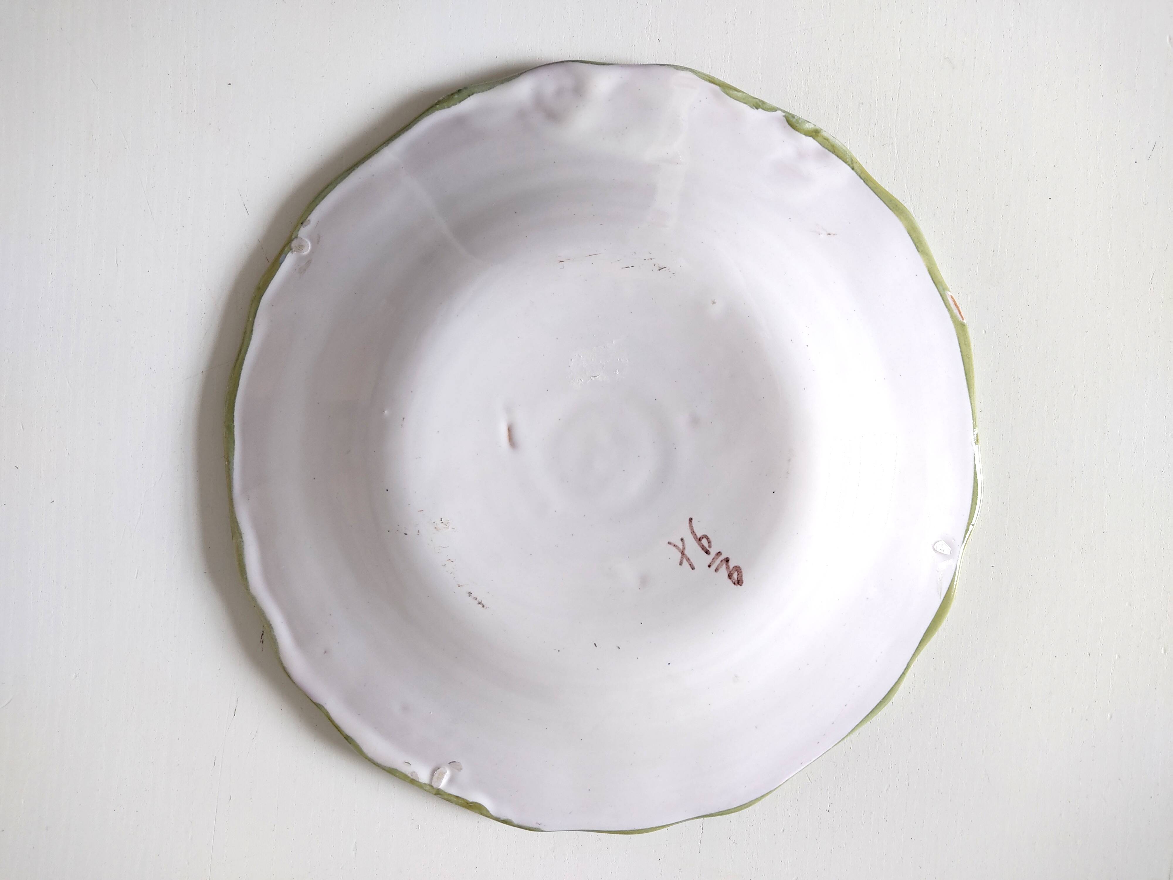 Moustiers earthenware decorative plate with bird