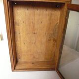 Old watchmaker's furniture wall display case