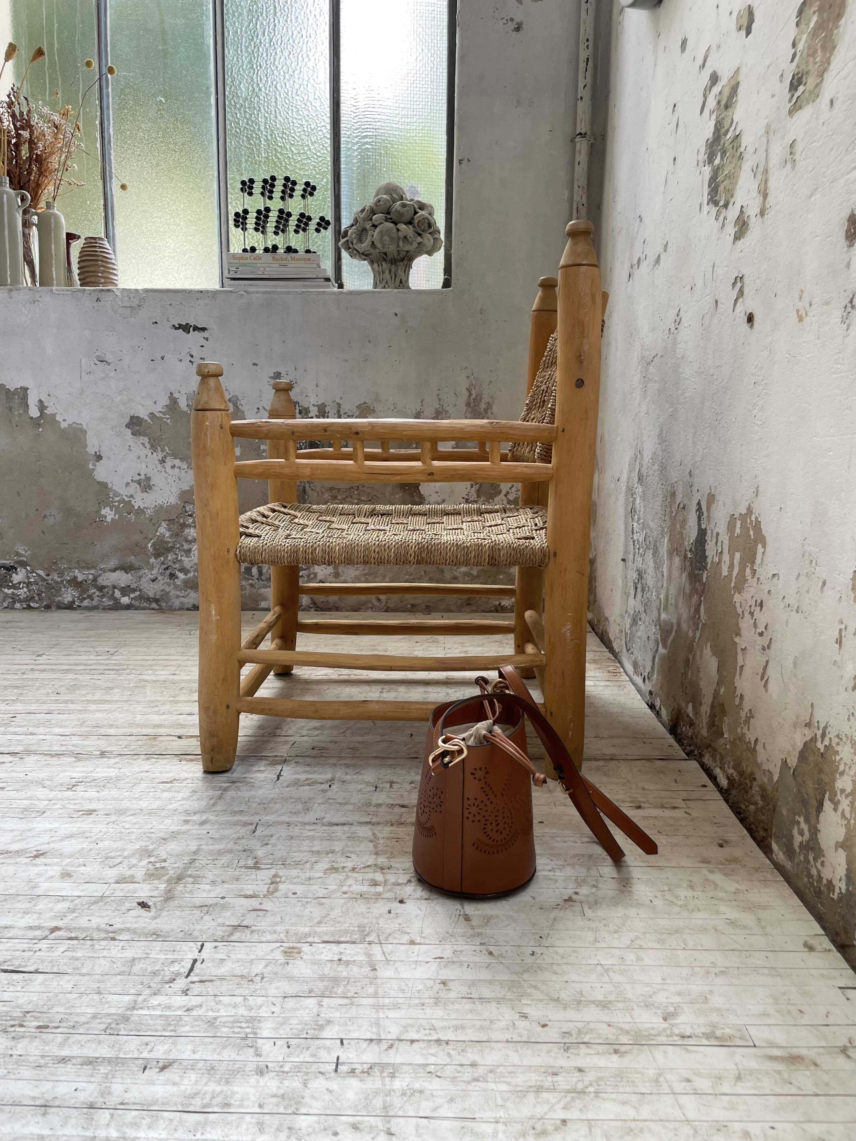 Moroccan wooden and rope armchair