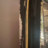 Napoleon III mirror with a pediment featuring black and gold dragons and birds.