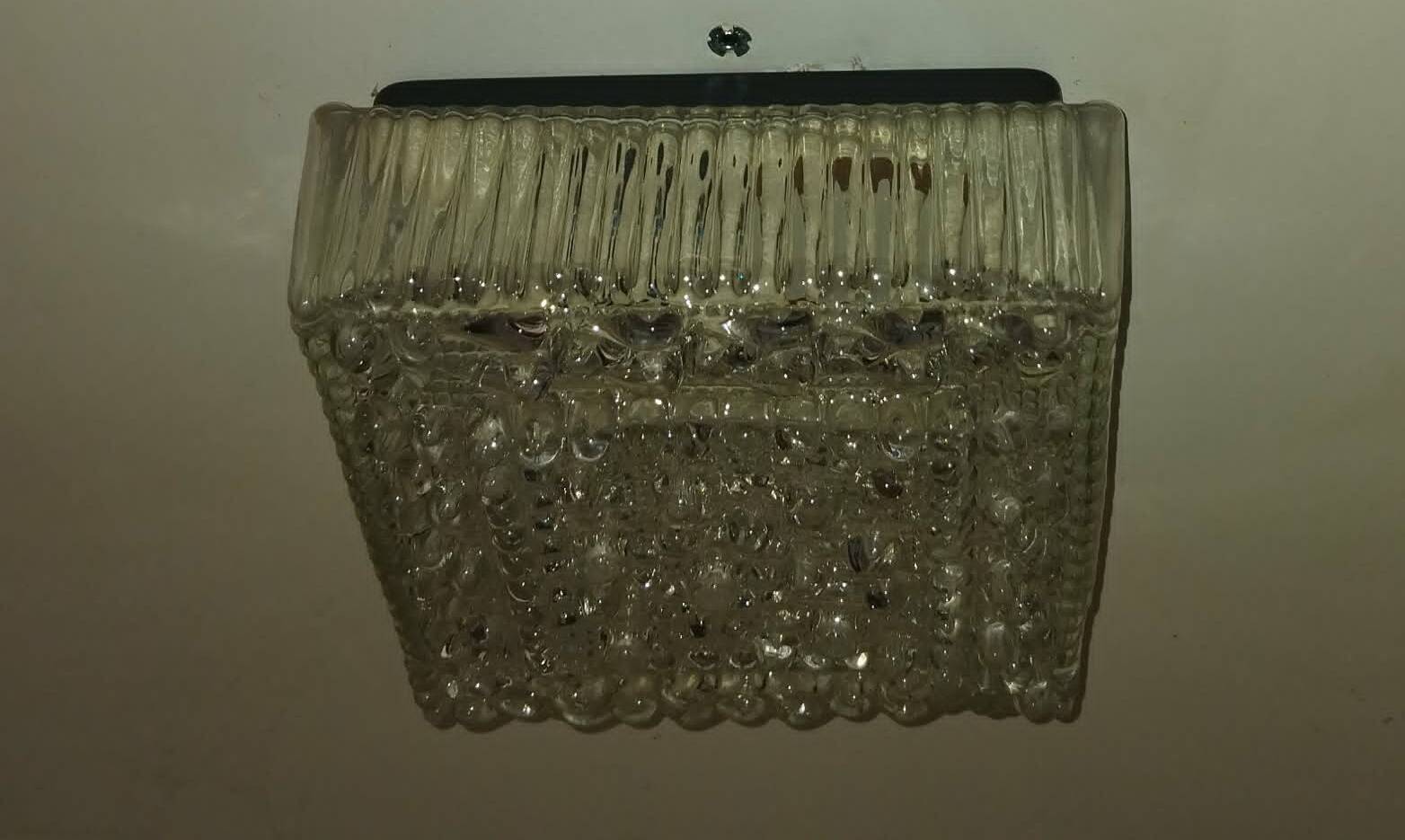 Square ceiling light made of moulded glass from the 1970s.