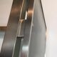 Beautiful console table in brushed metal with bluish glass shelves