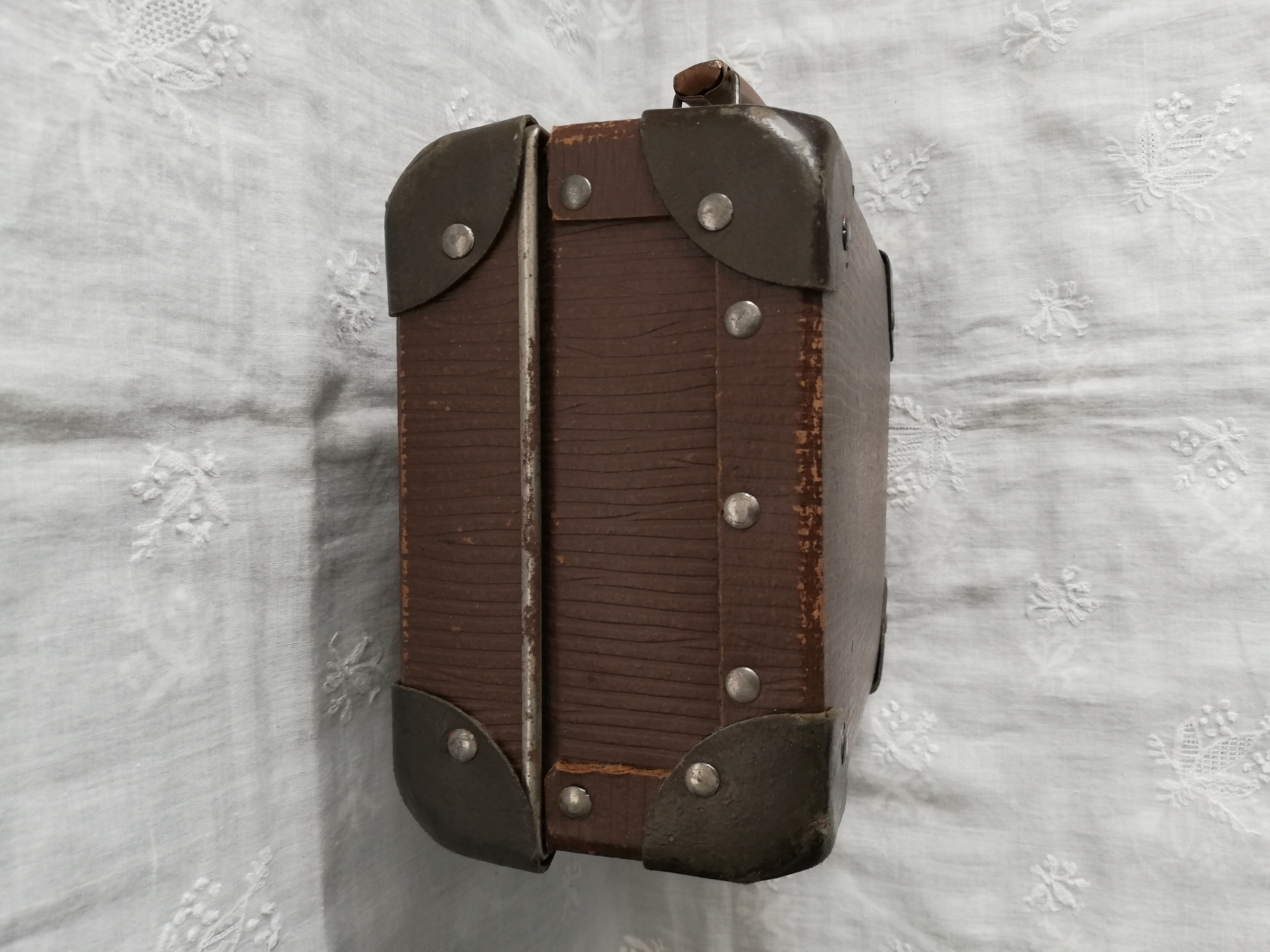 Old metal cardboard suitcase