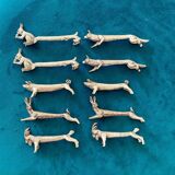10 animal-shaped knife holders in silver-colored metal