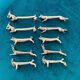 10 animal-shaped knife holders in silver-colored metal