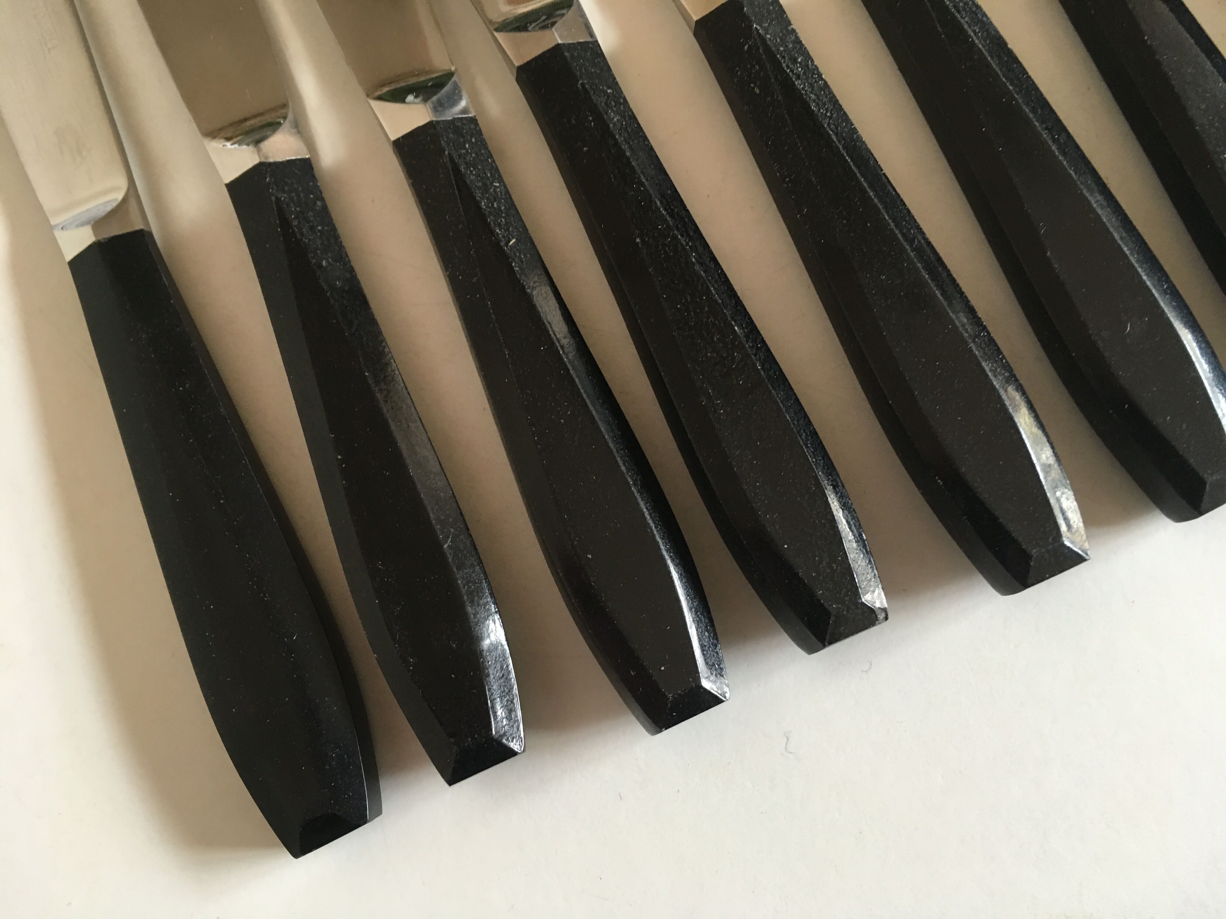 Set of 12 fruit knives in black bakelite