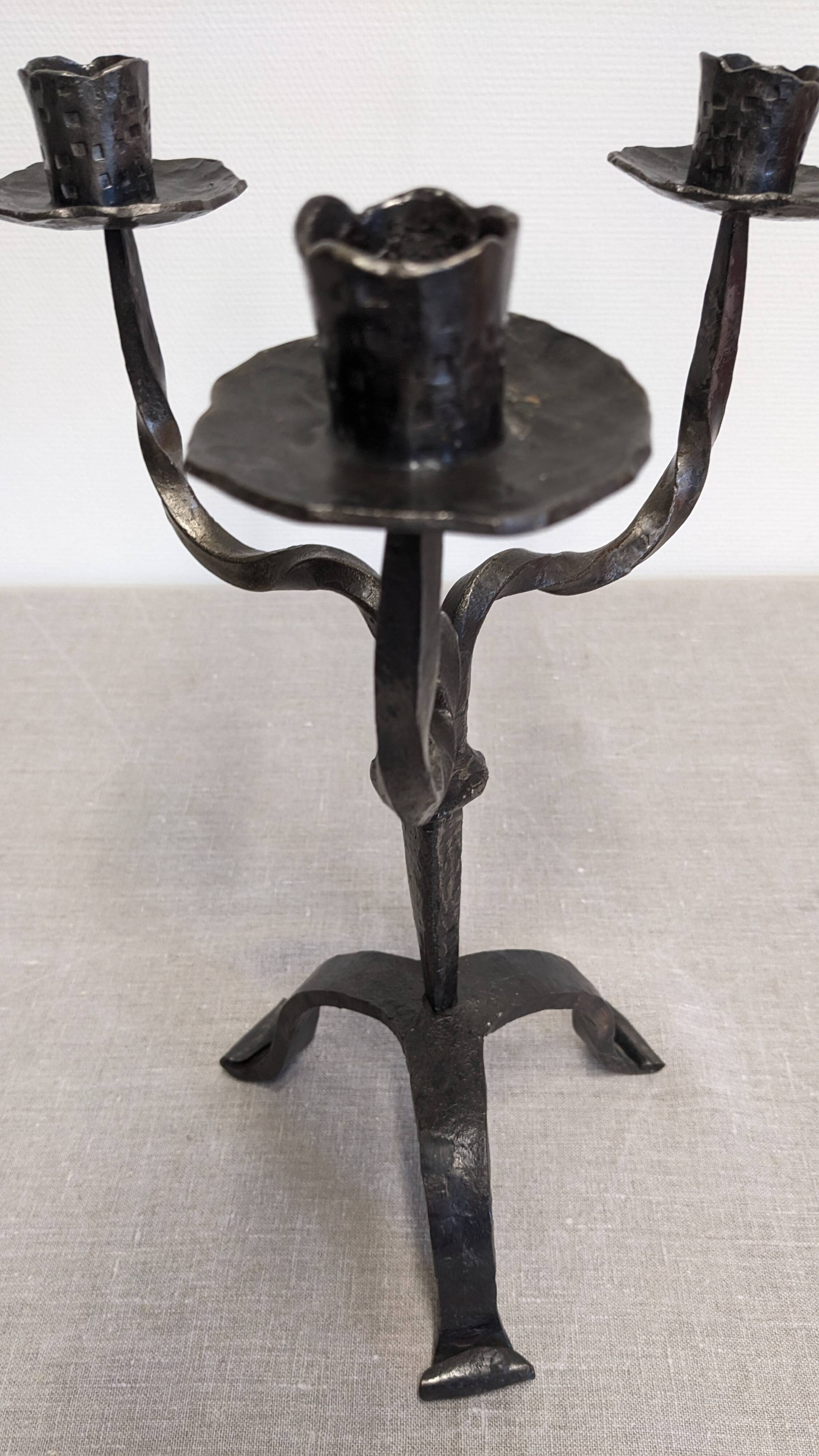 Brutalist candelabrum with 3 lights in wrought iron, France circa 1950.