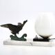 Art Deco lamp decorated with a flying duck, marble base, 1930s.