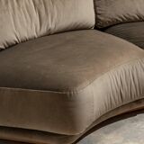 Large rounded velvet sofa