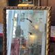 Antique mirror above a chest of drawers or between two windows, carved wood, 18th century