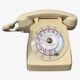 Téléphone à cadran beige vintage
