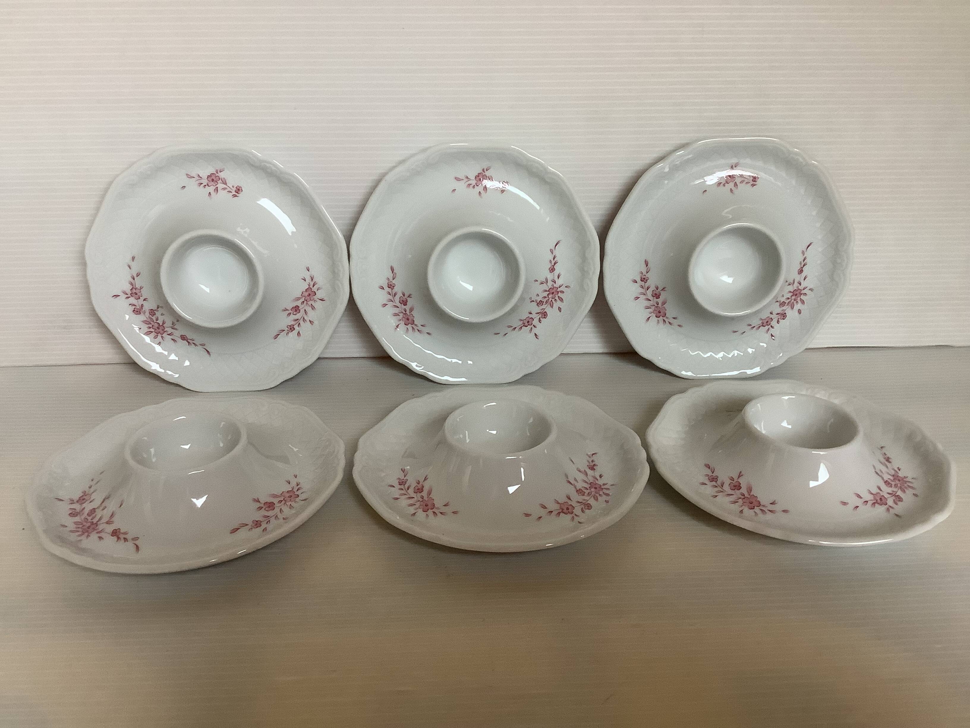 Six egg cups with toile de Jouy flowers