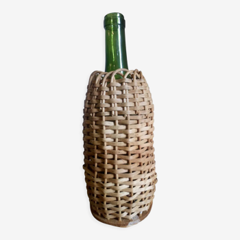 Bottle in a rattan basketry 50s